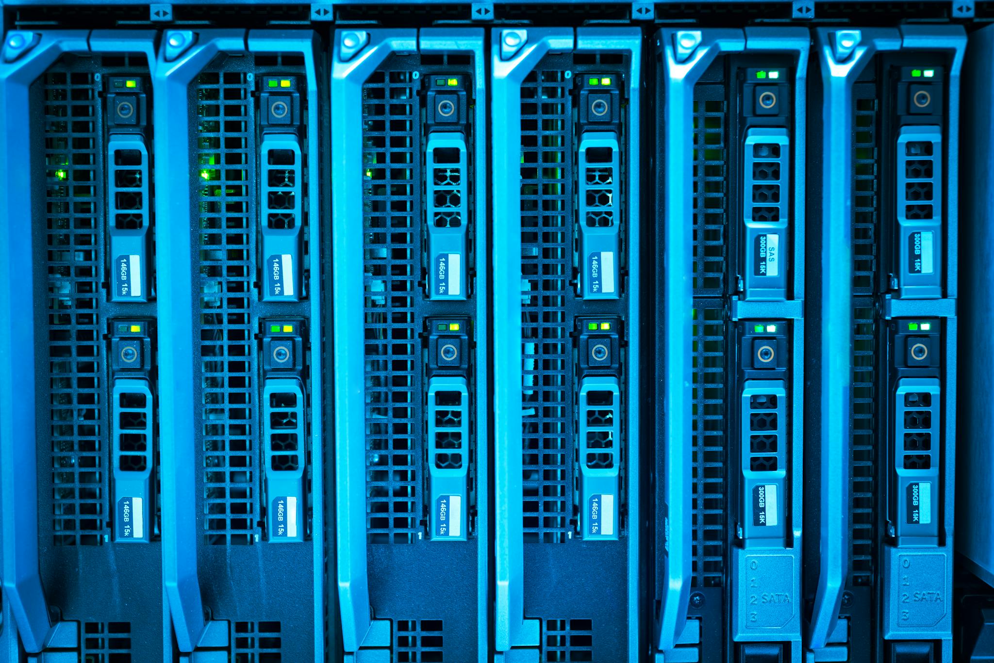 Detailed Image Of Illuminated Server Racks Showcasing